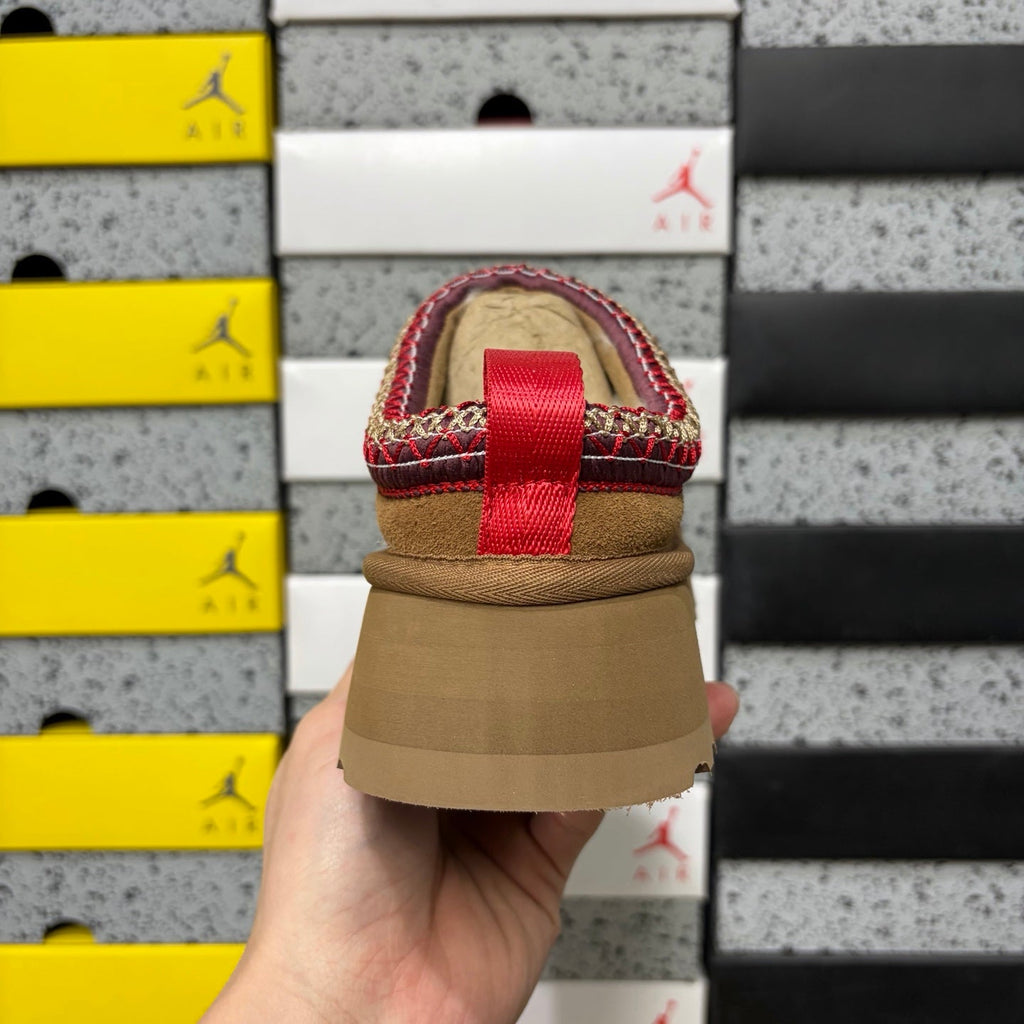 UGG Tazz Platform Slipper – Suede Mule with Shearling Lining, Red & Gold Braided Collar Trim, Red Pull Tab & Chunky Platform Sole in Chestnut